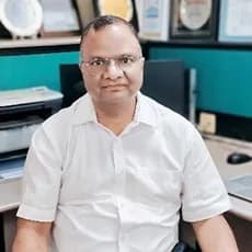 Dr. K. Madan Gopal